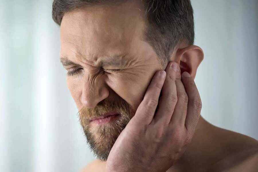 пулсиране в ухото